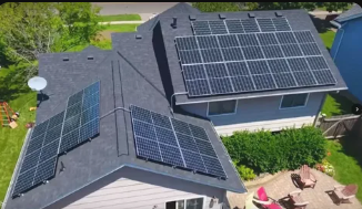 Homeowner reviewing a residential solar installation plan